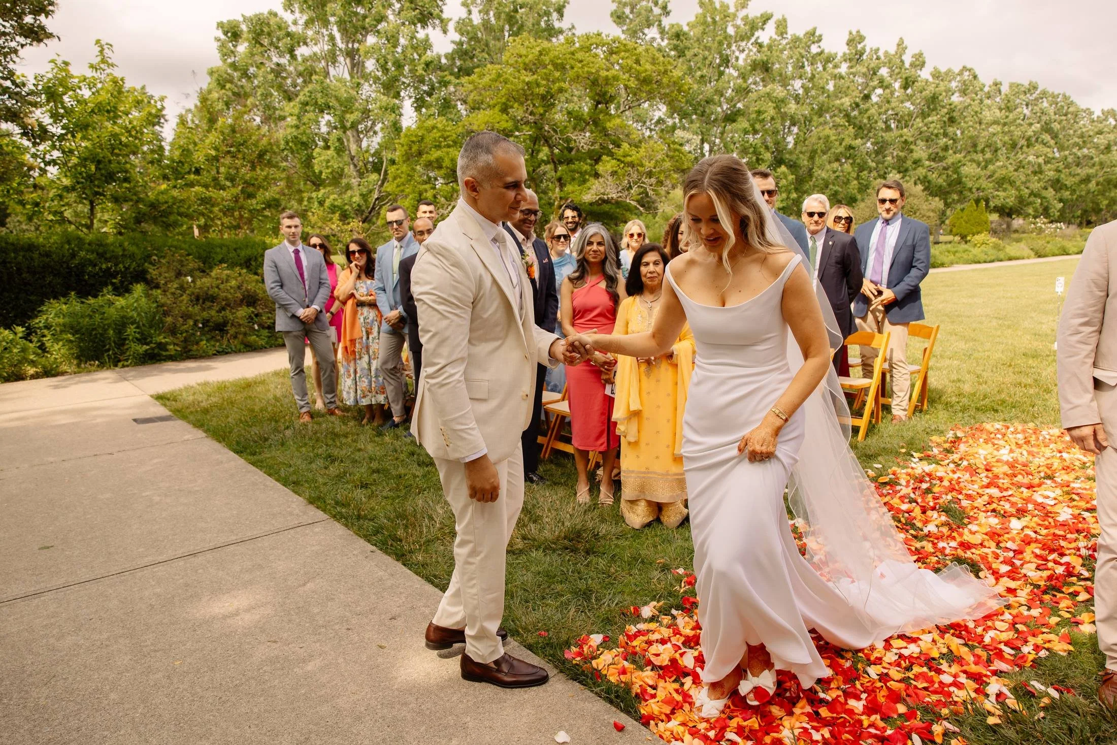 16-bride-walking-aisle-ault-park-rose-garden.jpg