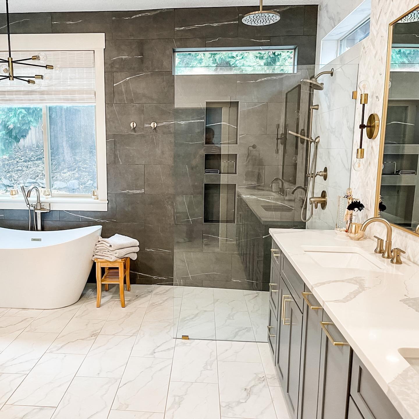 #tiletuesday ! This primary bed/bath is complete and we couldn&rsquo;t be happier to have our clients back in their beautiful space.  Gorgeous floor to ceiling tile, gold fixtures, walk-in curbless shower and many more features and pics coming soon&h