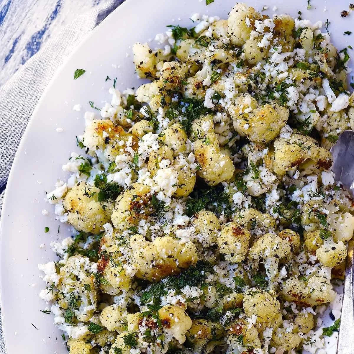 Greek Roasted Cauliflower with Feta and Garden Herbs