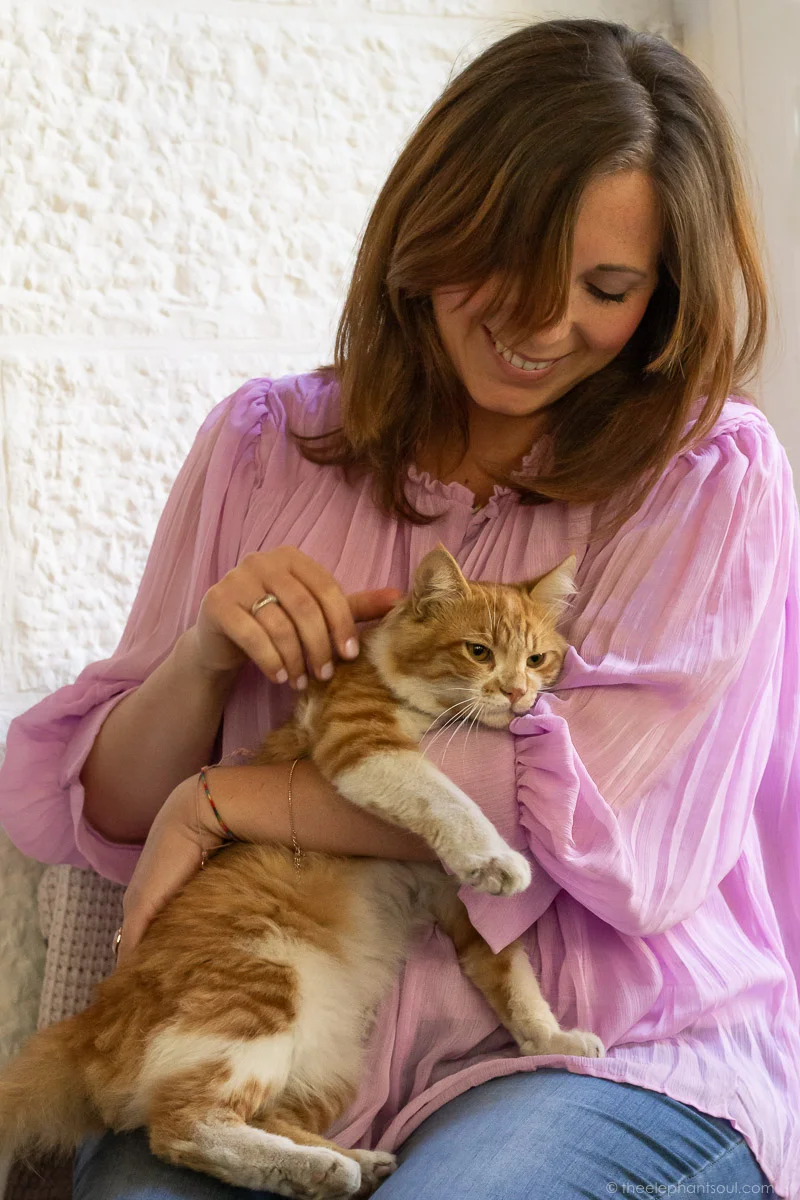 Pictured here is knitting designer Marielle Zatar with her personal assistant, Pepper.
