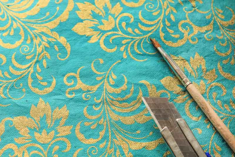 This is one of my favorite kinds of lokta paper. The teal with the golden motifs served as the background for one of my “namaste” #handmade prints.