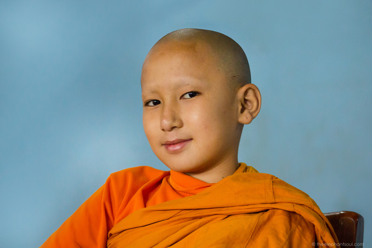 This is one of my favorite photo sessions I did in Nepal. It took time and perseverance until this young monk finally decided to look into my lens.. This image was taken in Bhaktapur, Nepal. © Diana, The Elephant Soul