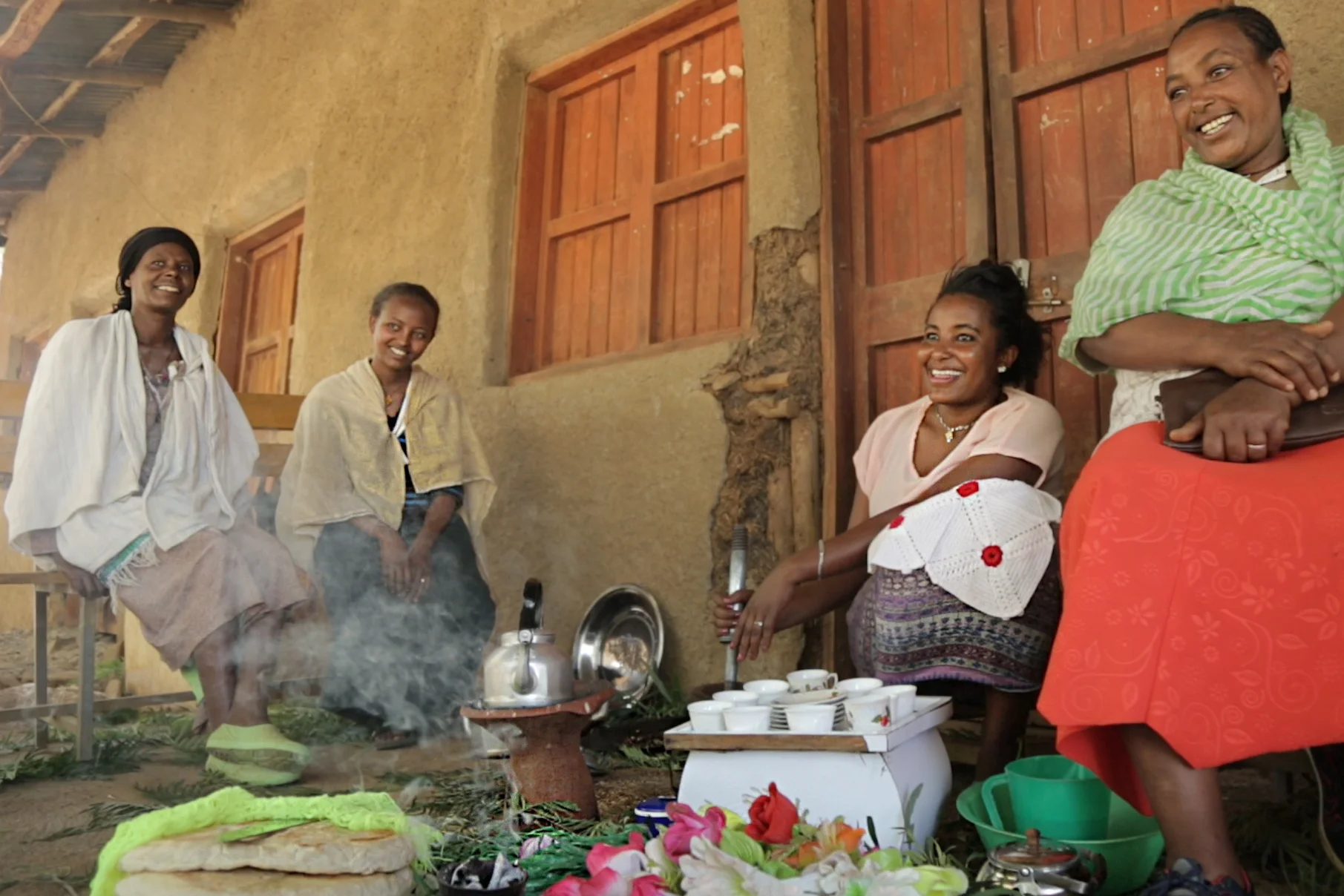 left to right: Haymanot, Serpik, Ataklit, and Mareye, the local health extension worker Together they sit and chat with other women staying at the maternity waiting home while Ataklit makes afternoon coffee