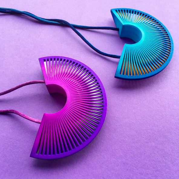 Lynne MacLachlan Lynne's designs play with light, space and colour, intending to create visual delight for wearer and viewer. She takes an experimental approach with digital tools, exploring and pushing the capabilities of these, using bespoke software tools and 3D printing to materialise complex forms. Combining these tools with meticulous hand finishing techniques, such as dying, polishing and construction, elevates the pieces further.