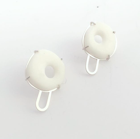 Rebecca Wilson Drawing inspiration from the confectionary industry her jewellery collections aim to glamorise the simple pleasures in life. Having explored the rainbow spectrum of sweet treats from penny chews and lollies in luminous packaging, to cakes and pastries piled with cream, fruit and icing, she has distilled these treats down to their simplest forms, colours and compositions.