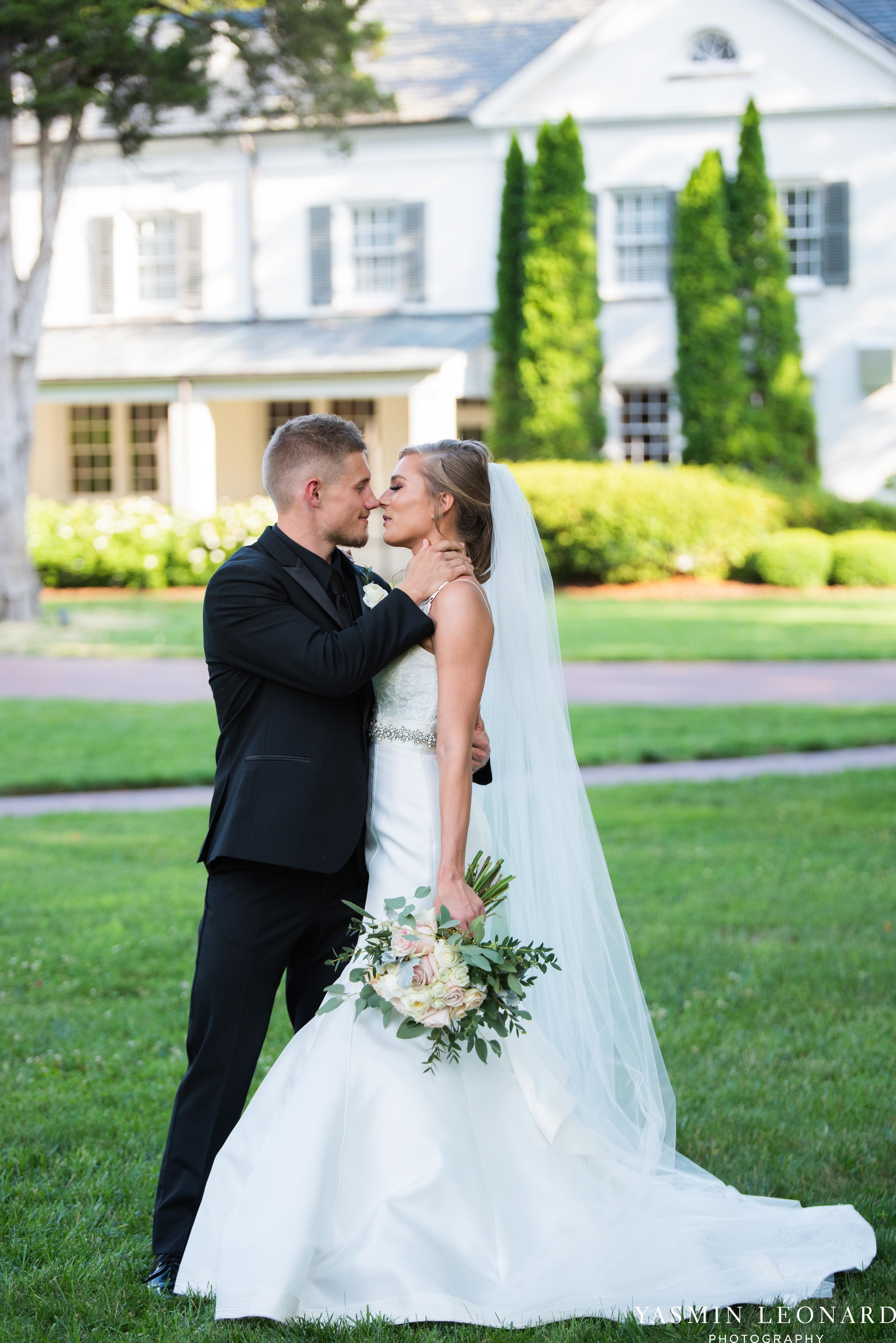 Boxwood Estate - Boxwood Estate Wedding - Luxury Wedding - Black and White Wedding - NC Wedding Venues - NC Weddings - NC Photographer - Lantern Release Grand Exit - Large Wedding Party - Yasmin Leonard Photography-38.jpg