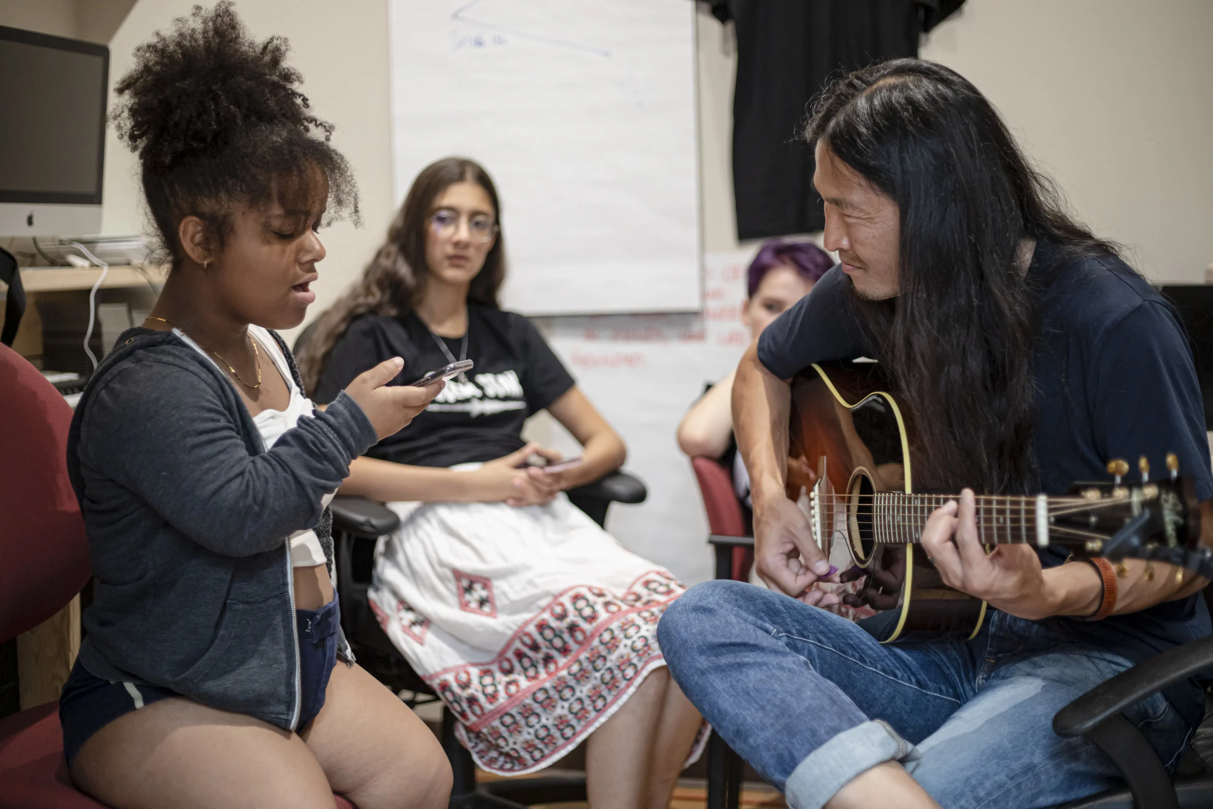 Nikai works on her new song, “Peace Of Mind” with Pak. Photo taken by Amy Piñon.