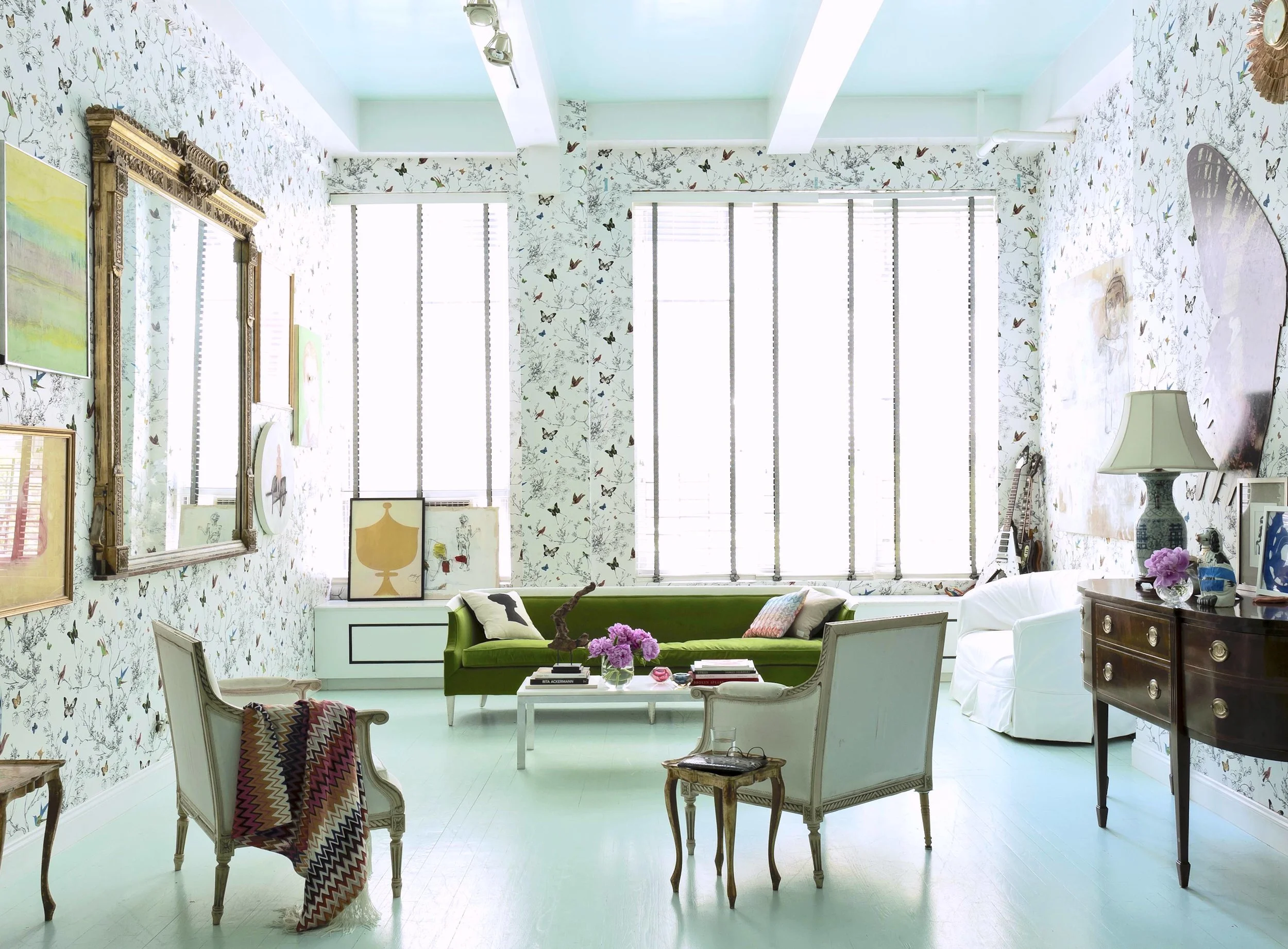 When Atlanta native Chassie Post, first saw the Manhattan loft where she and her family now live she totally dismissed it. Who would have known! Thanks partly to the genius of her über talented friend, decorator Miles Redd, and visionary renovations by architect-duo Meyer Davis, the spacious loft now has the look of a very chic aviary. Chassie, like a beautiful bird of paradise, now resides among butterflies and sparkly guitars with her musician husband Phil Costello and their 8-year-old son.