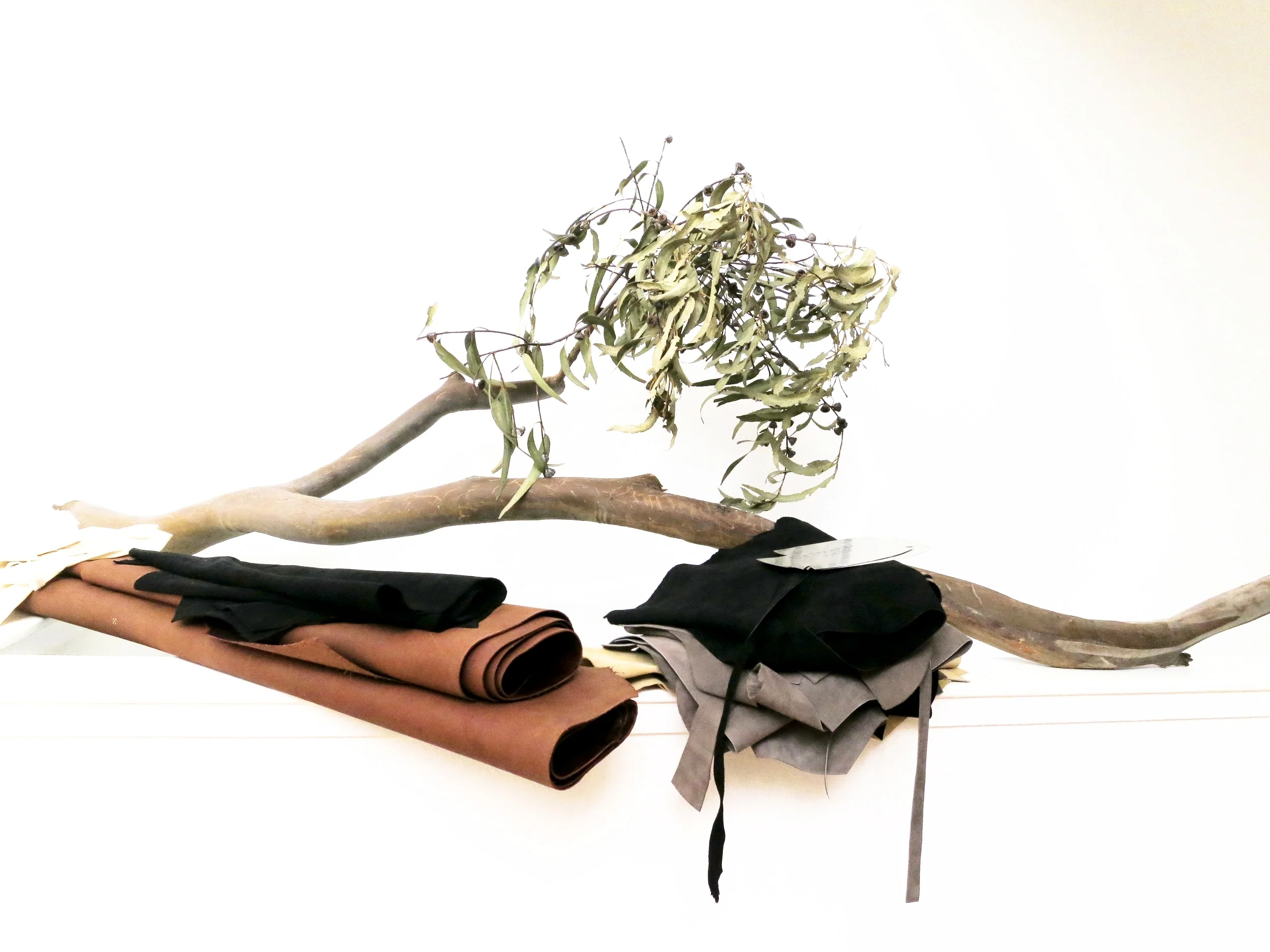An olive tree branch and bundles of leather scraps arranged in a still life are symbolic of Racuk’s organic, natural aesthetic which clearly inspires the elegant, simple design of his leather goods all available at basilracuk.com . “I am inspired by everything - most importantly the human spirit always amazes me,” he says