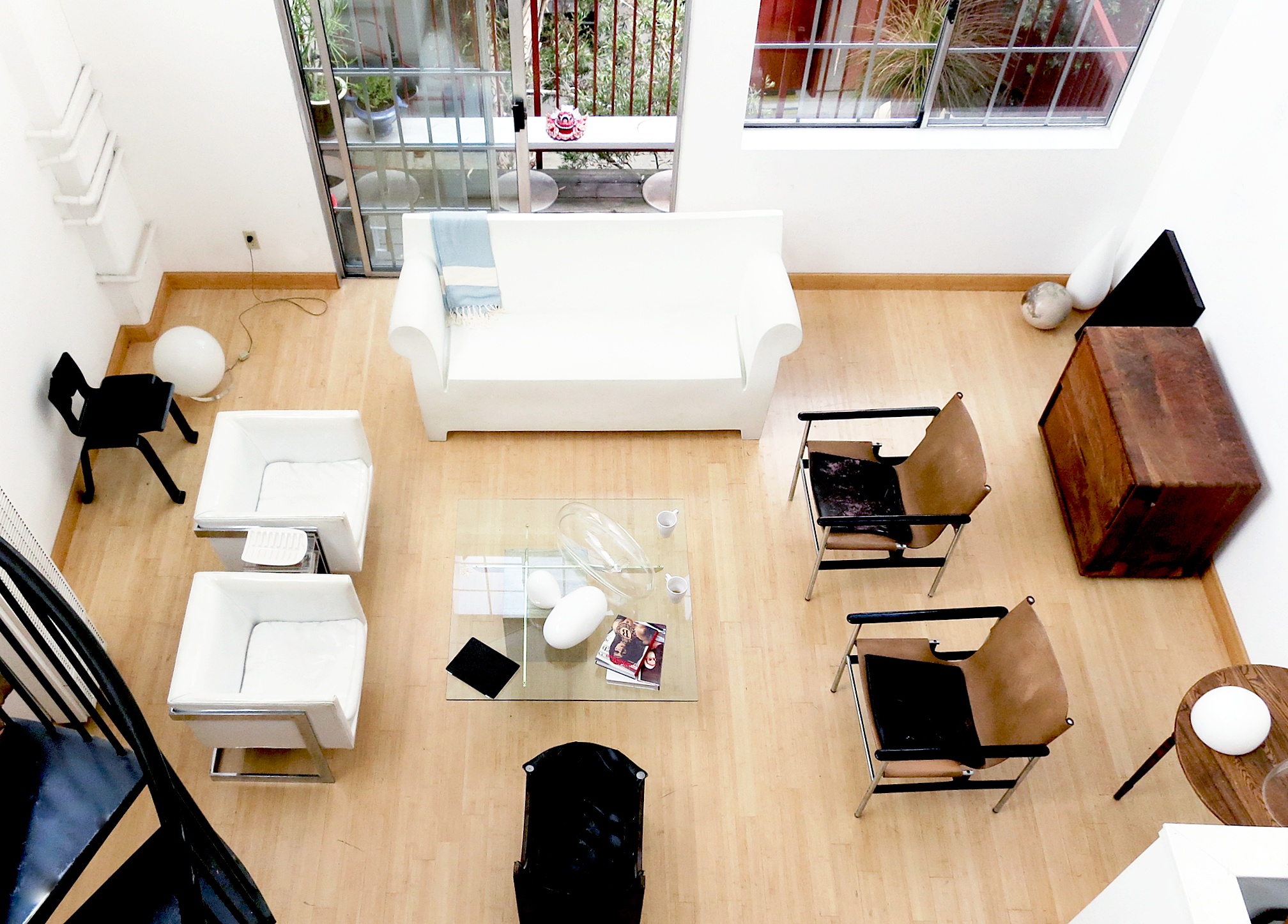A bird’s eye view of the living room from the top of the spiral staircase.