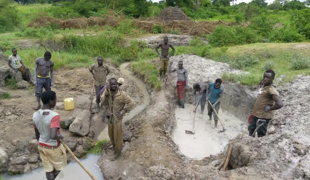 Aguroi community constructing their water source.jpg
