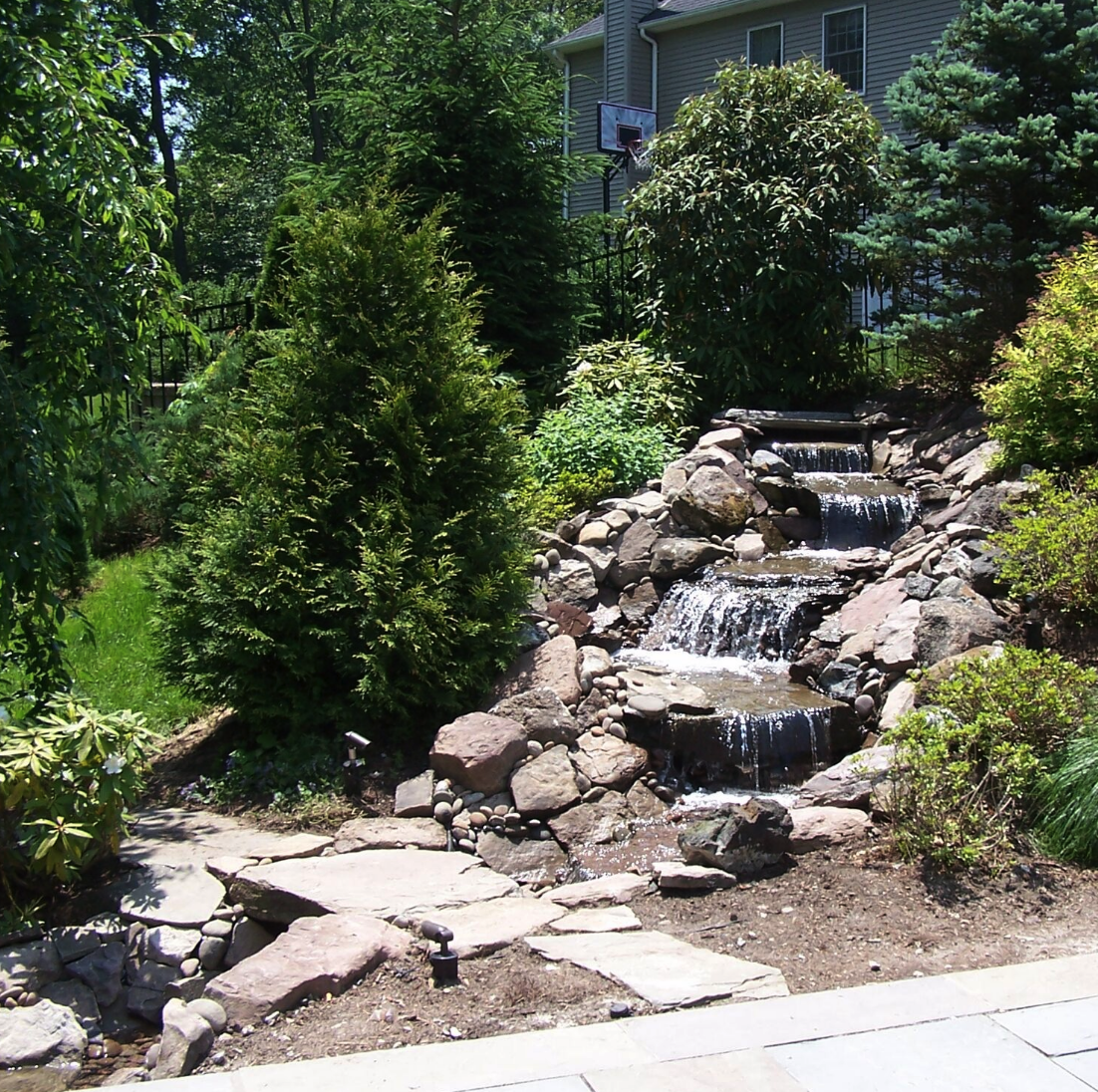 Westchester County, NY custom masonry design steps water fountain