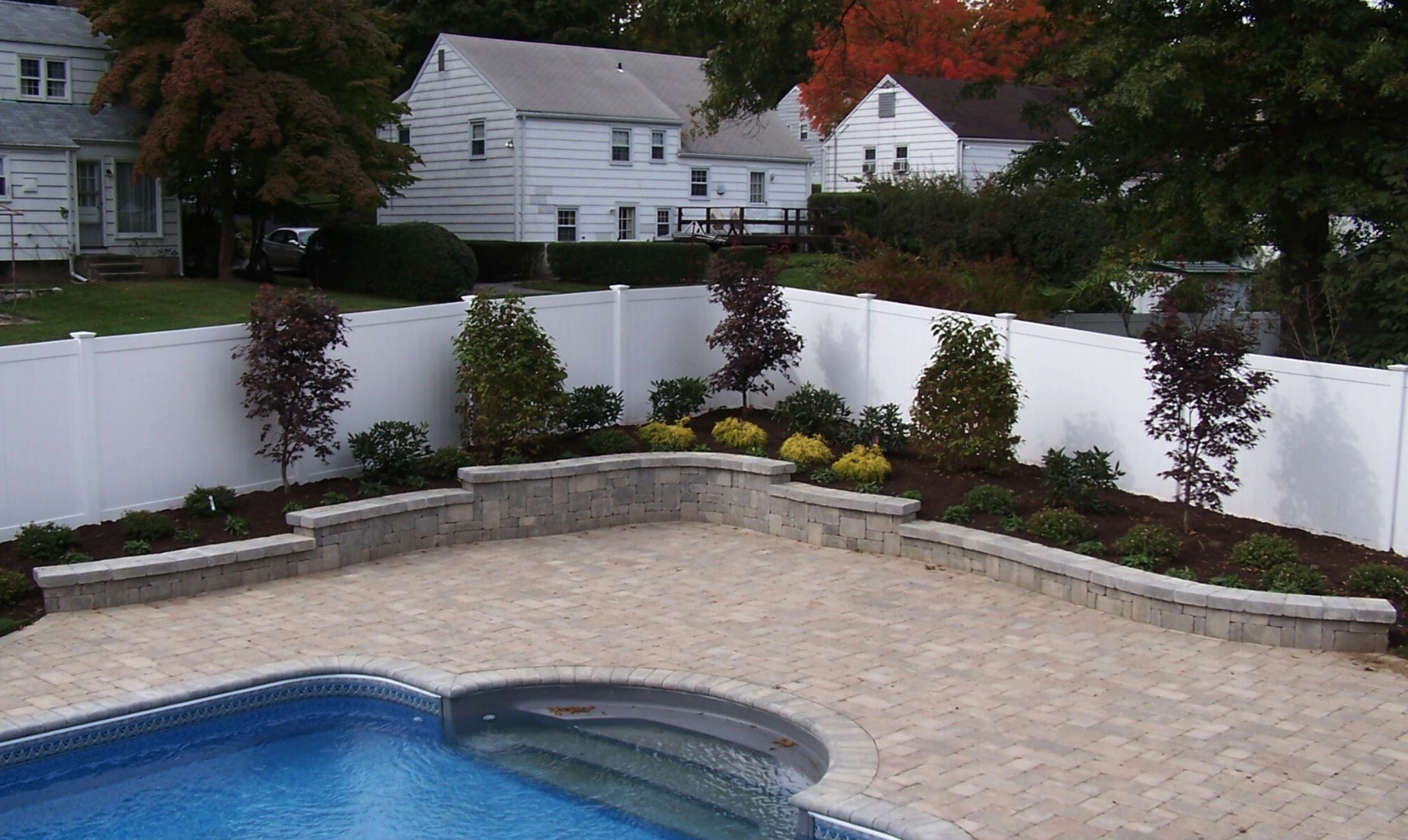 Westchester County, NY custom masonry around swimming pool and patio