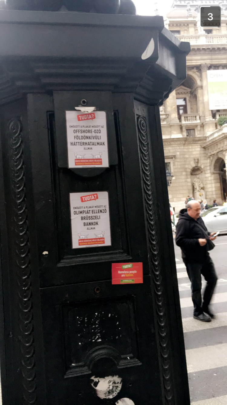 Outdoor sticker placement beside other ‘Tudta?’ (did you know?) stickers — one of the Hungarian government’s anti-immigrant propaganda tools