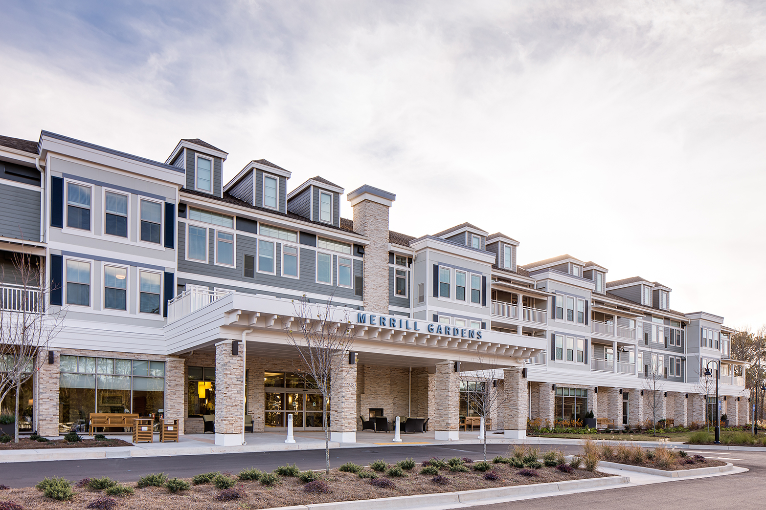 Front of building features symmetrical exterior.