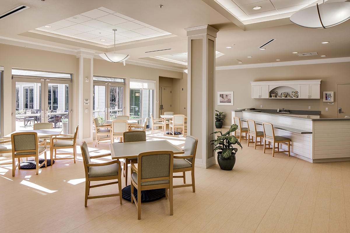 Memory Care dining area with bright and airy interior feel.