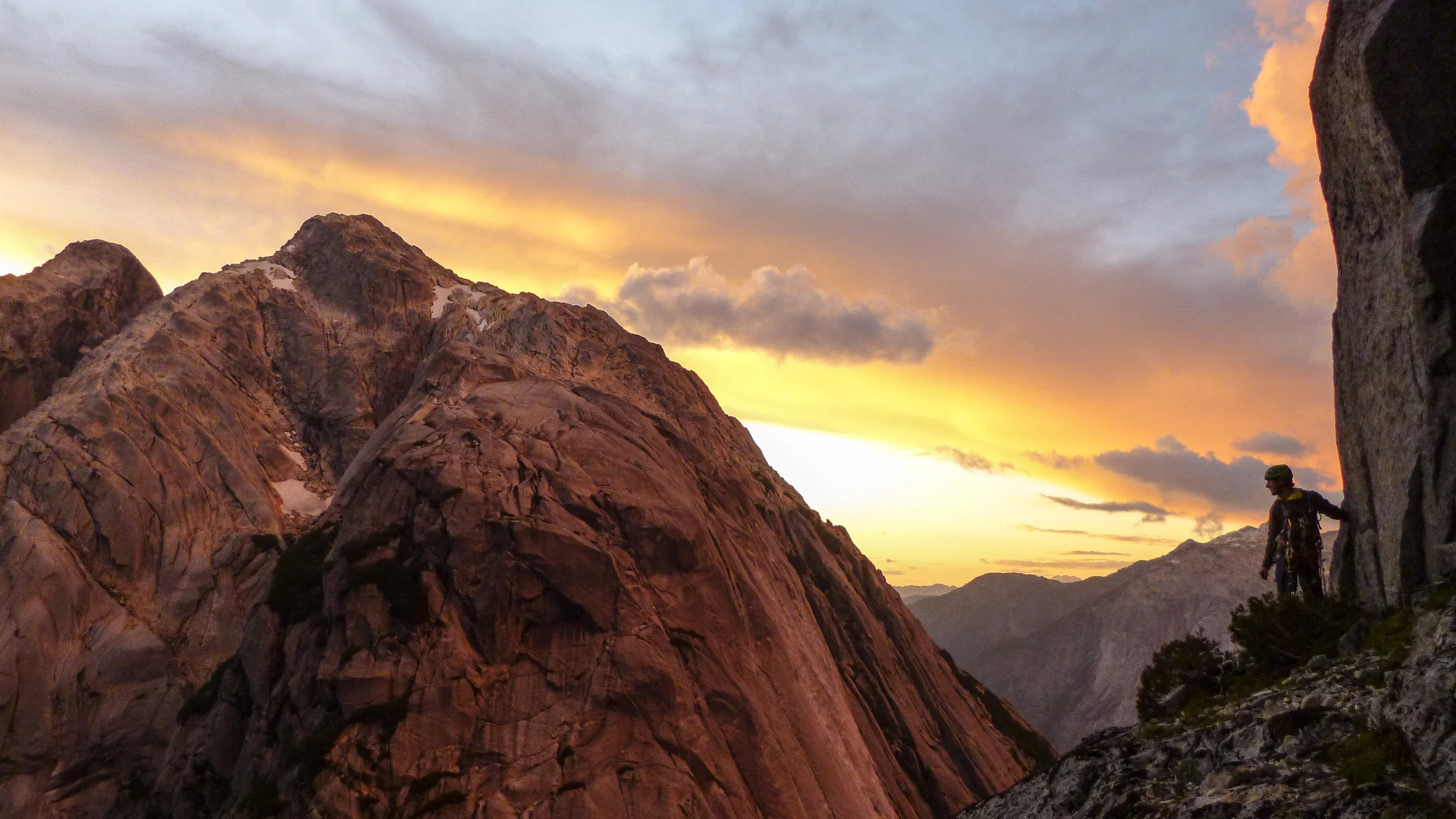 Las Manos del Dia Daniel Seeliger taking in the sunset while scouting out the descent.