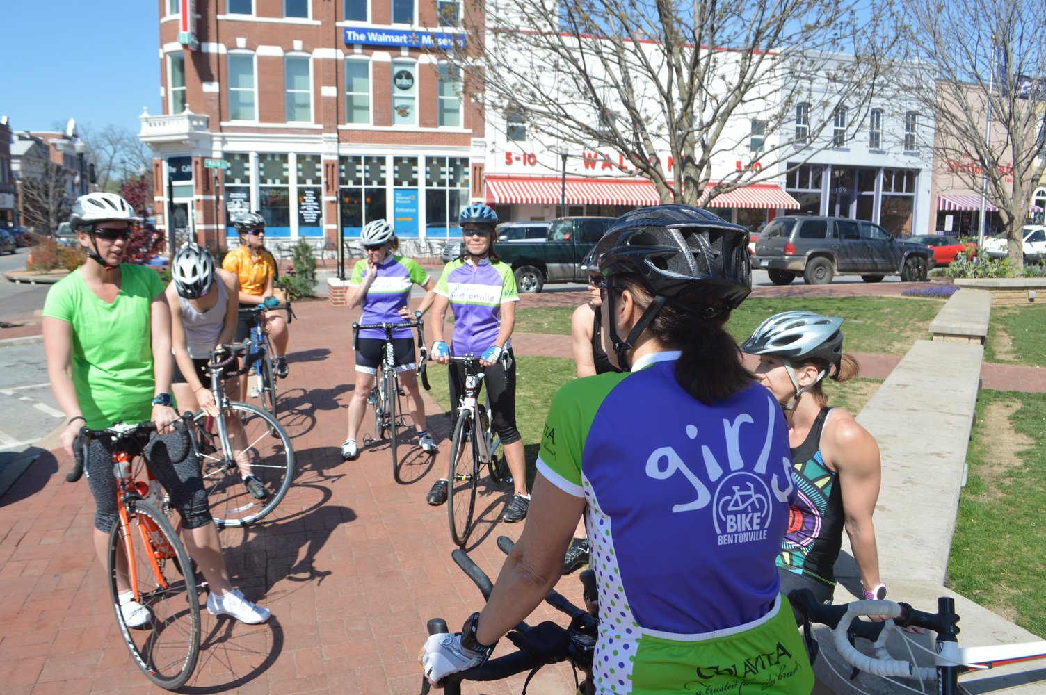 Cyclists prepare to take part in a  Girls Bike Bentonville  group ride. One of the group's weekly intermediate level rides starts on the Bentonville Square at 11:15 am on Tuesdays. The group hosts regular weekly rides on Tuesdays, Thursdays and Saturdays.