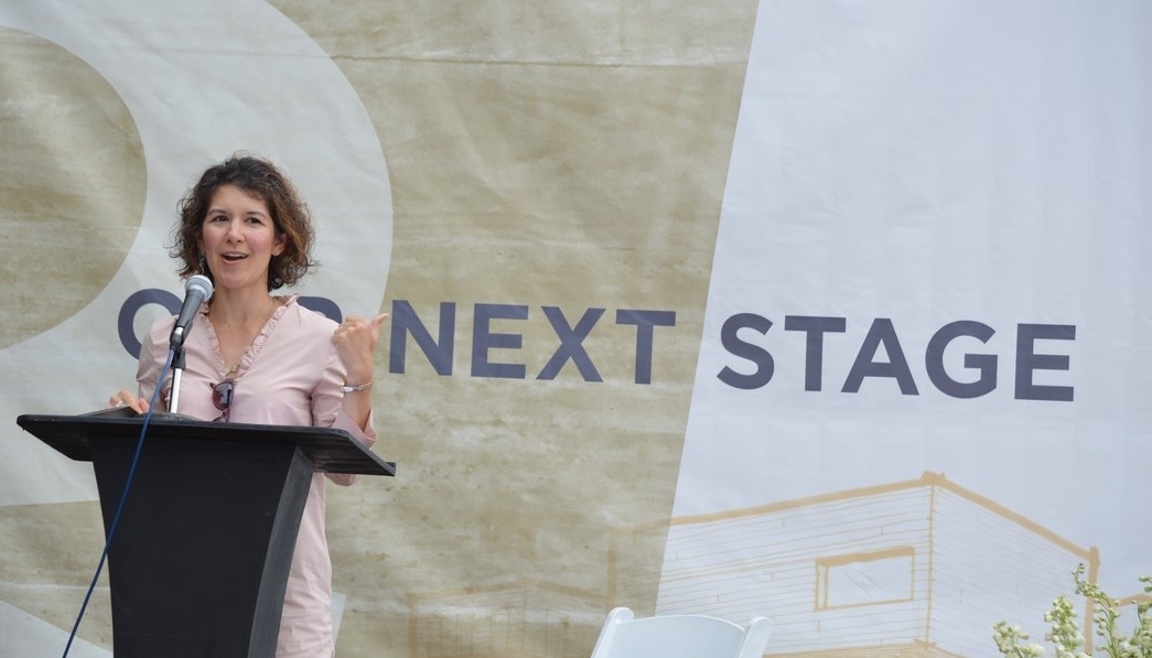 Karen Minkel of the Walton Family Foundation was among those who talked at Friday's groundbreaking ceremony about TheatreSquared, the region's only professional theatre company.