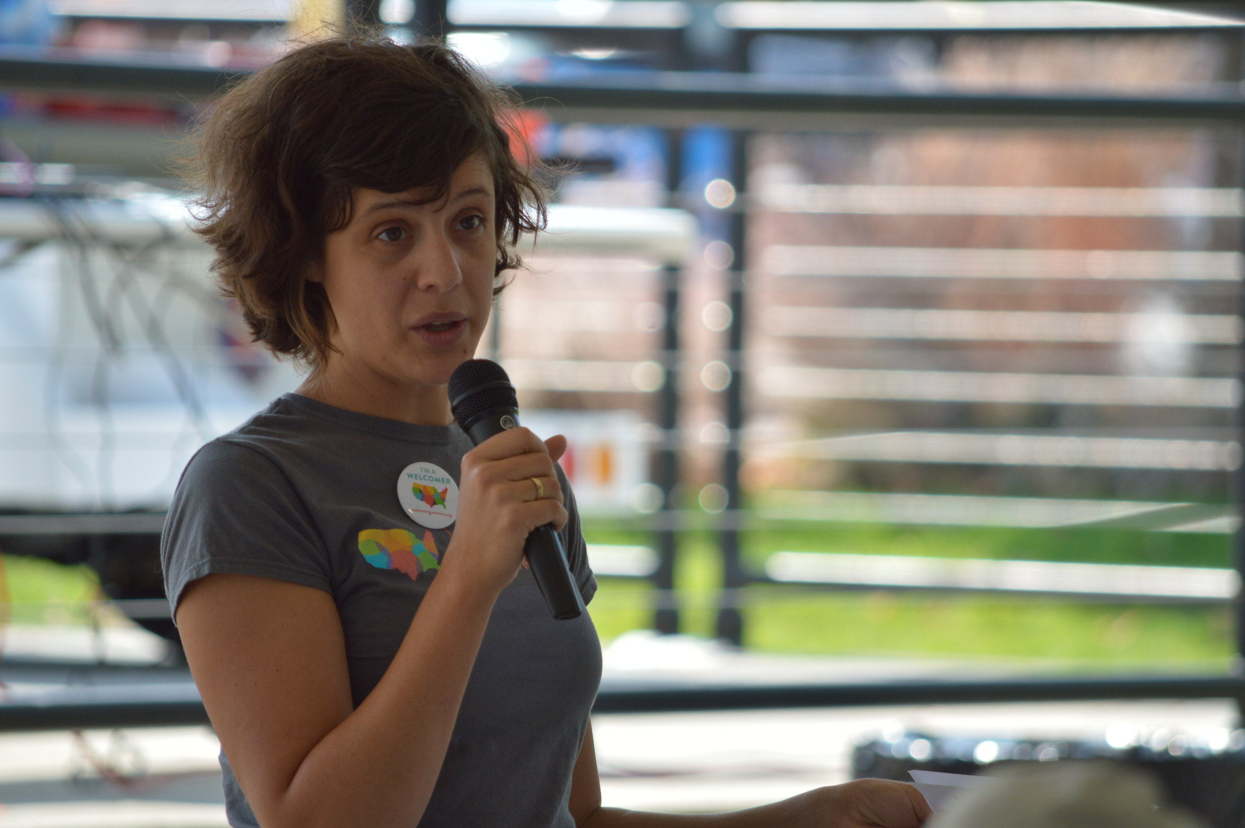 WelcomeNWA Director Margot Lemaster talked Saturday at a National Welcoming Week event in Springdale about the Northwest Arkansas Council's new initiative.