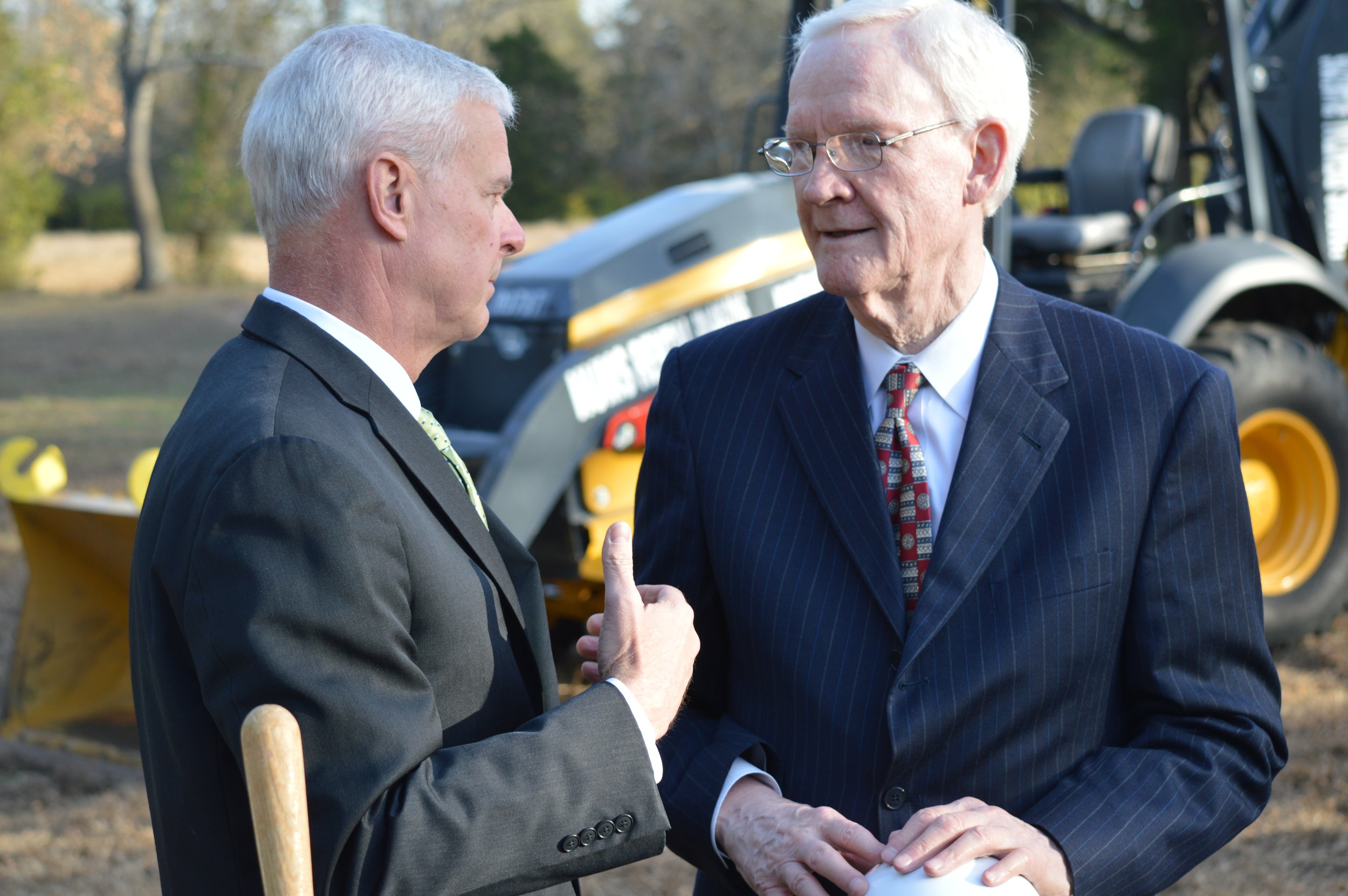 U.S. Rep. Steve Womack talks with OurPharma CEO Peter Kohler after a groundbreaking ceremony on Monday. Kohler's new company announced it will manufacture generic drugs in Northwest Arkansas, and construction on the company's new facility will start this winter.