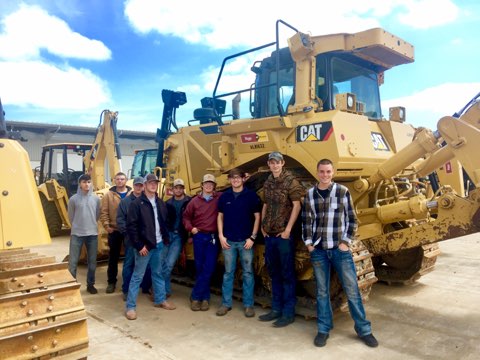Workforce development programs at the Springdale School of Innovation and other schools are increasing skilled labor in Northwest Arkansas.&nbsp;The picture shows Springdale students on a field trip to learn more about diesel technology.