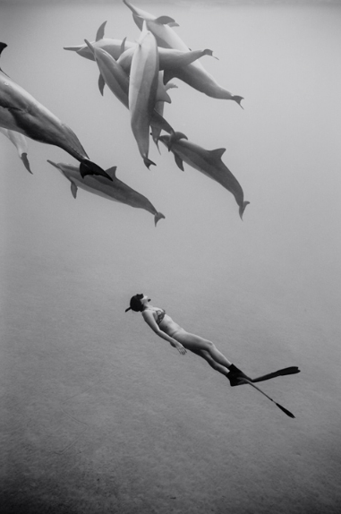 Kimi Werner with Dolphins #1 (B-339) / Edition #2/25, 2011/18, Archival Pigment print / 24"x16" image size, 25"x17"