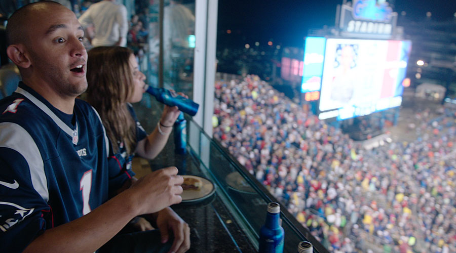 BEFORE: The original footage contained a woman drinking a bottle of Bud Light in the background