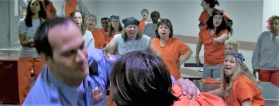 That's her. Looking pretty tough standing next to the woman in the bandanna. 