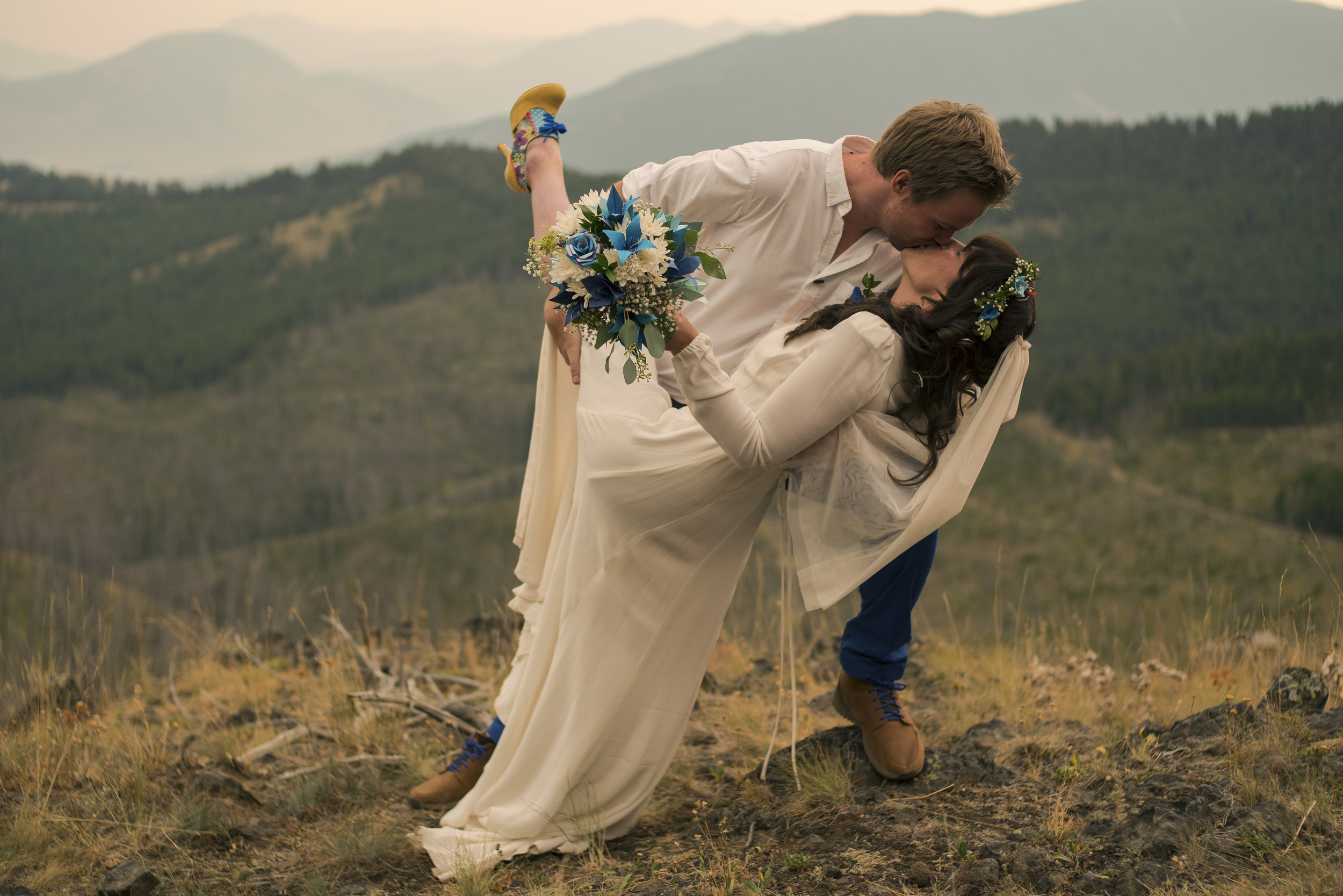 Sealing the deal with my husband John Sweeney high in the Montana mountains