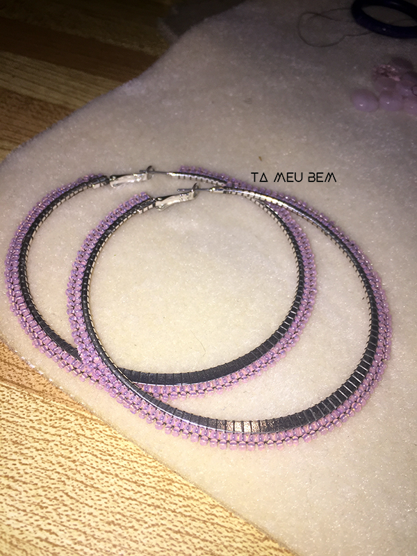 Sometimes I love taking a break from the norm. I can make necklaces, earrings, rings, bracelets, waist beads, breast plates, headdresses and I'm looking to expand that list everyday. These earrings are for my mentor's daughter. They're woven with 110 year old vintage seed beads. Opal - Pink - France - 11.