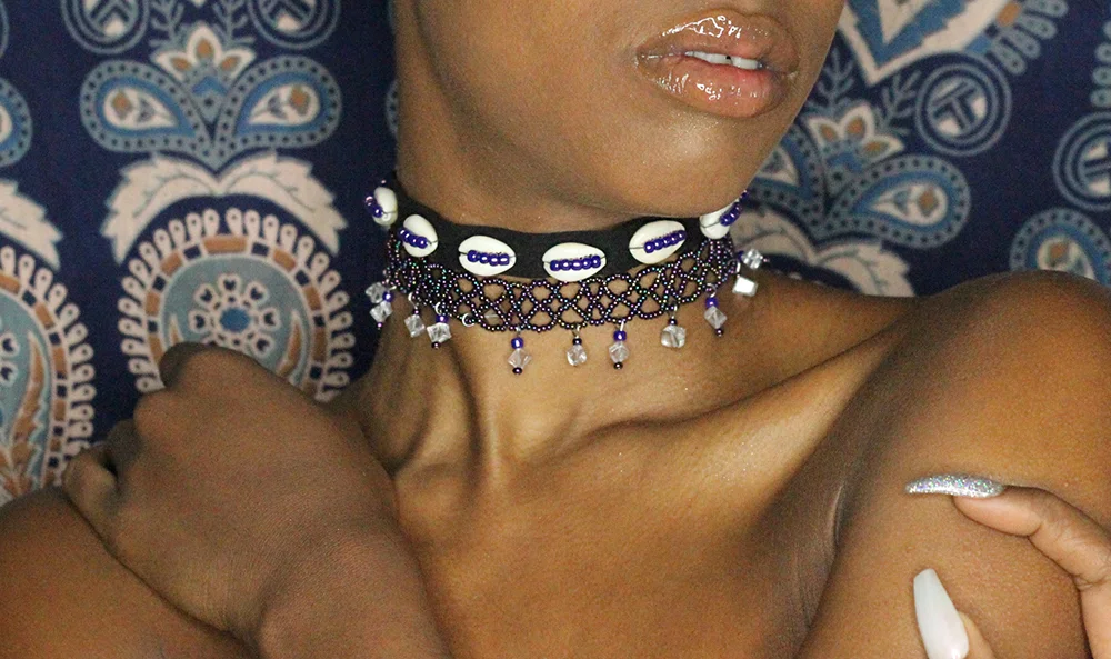 Tiara beaded cowrie shell choker.jpg