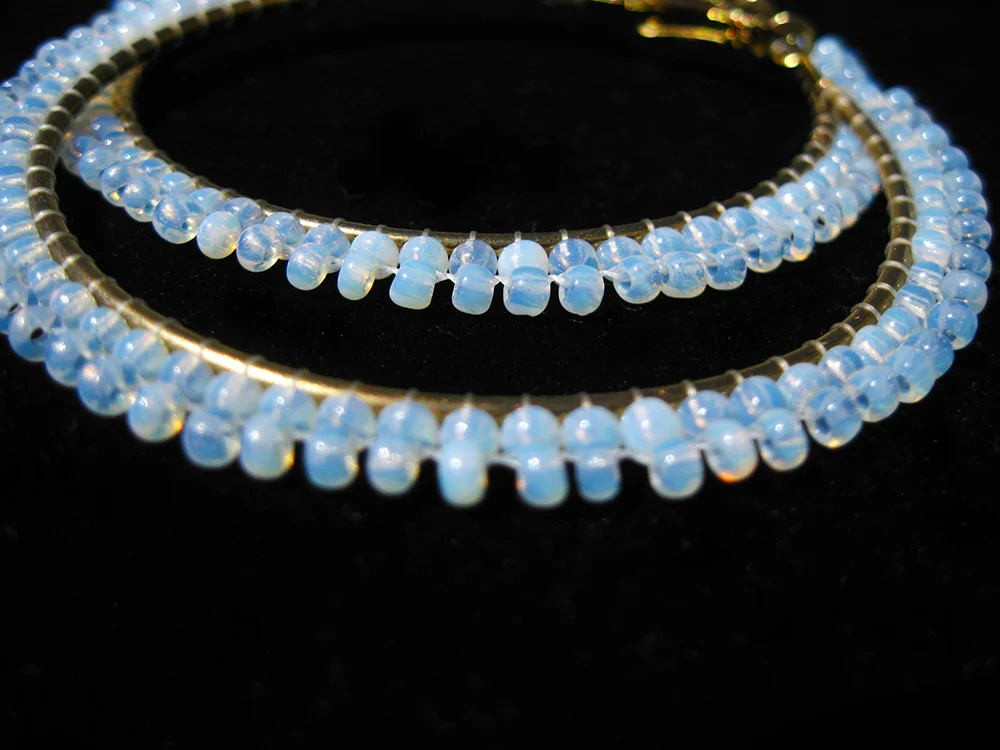 beaded hoop earrings with seed beads.jpg