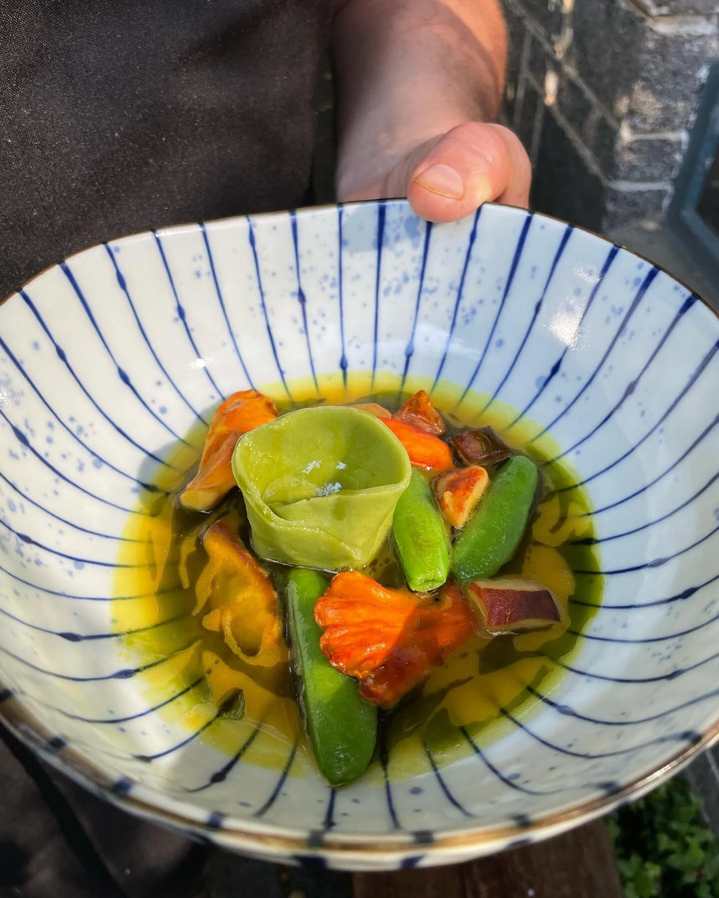 #Chanterelle tortelloni
Snap peas and Wild mushrooms (lobster and chicken of the woods)
In Split pea broth with #nori oil

#seattlerestaurants 
#vegan #seattlevegan #vegetarian #seattlevegetarian #seattlerestaurants  #seattlerestaurantsandbars #tasti