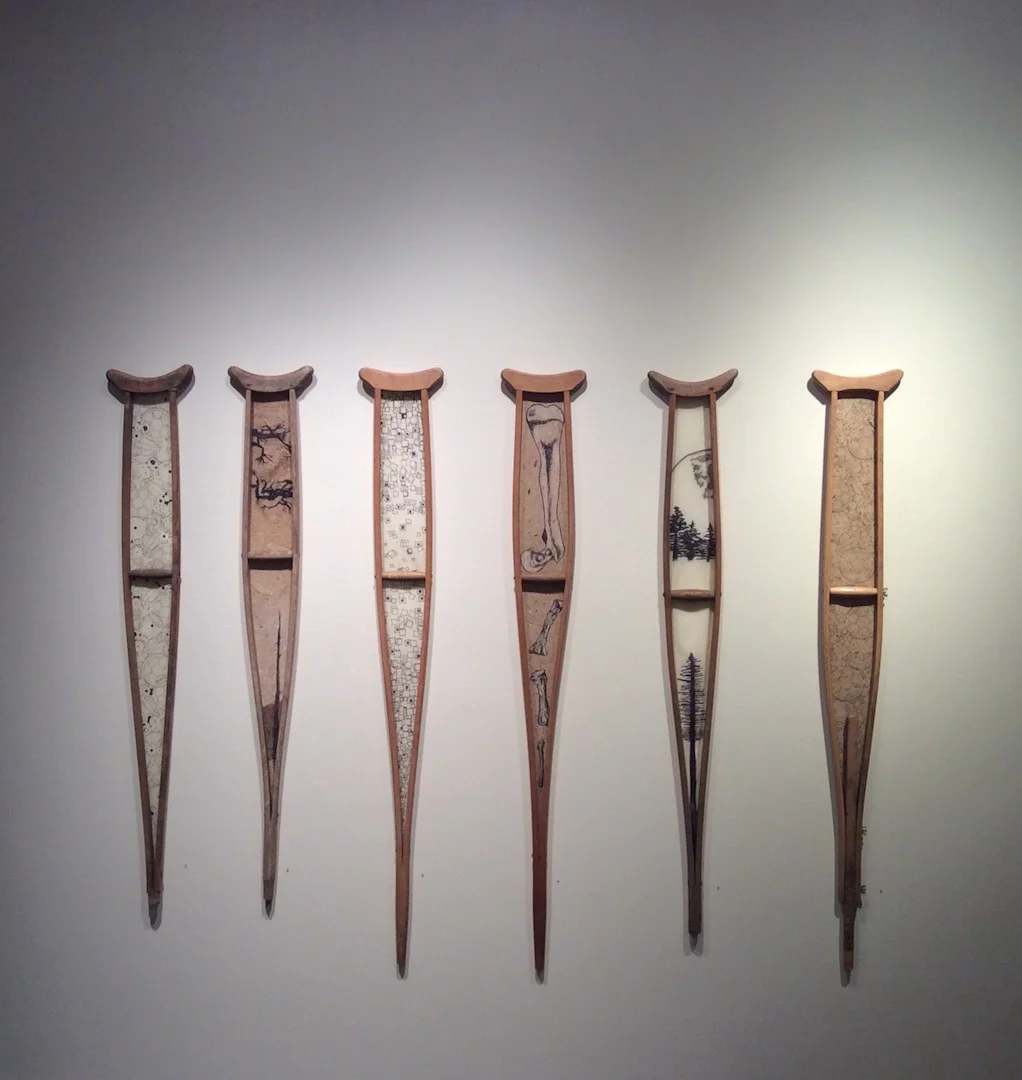 Untitled #'s 1-6, 2015 marker, chalk, conte', on cotton & banana papers, wooden crutches, hardware. #1 & #3 Available in Store.
