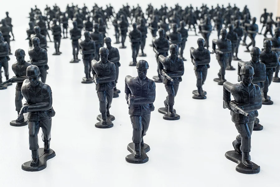 Installation View, detail. Toy soldiers, aerosol paint, 4”.