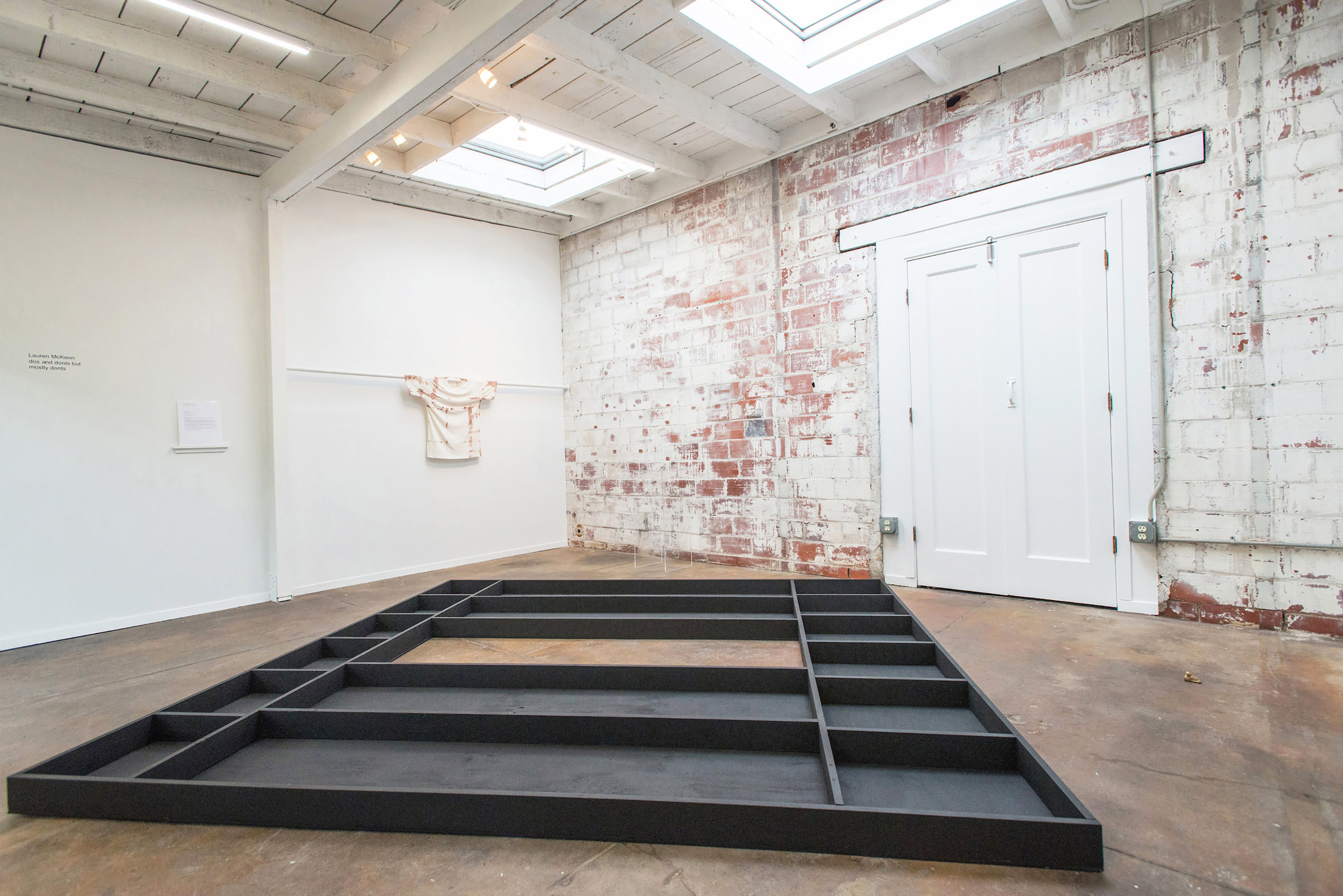 Installation View Floor piece, Untitled Wood, gesso 8'x9'x5'