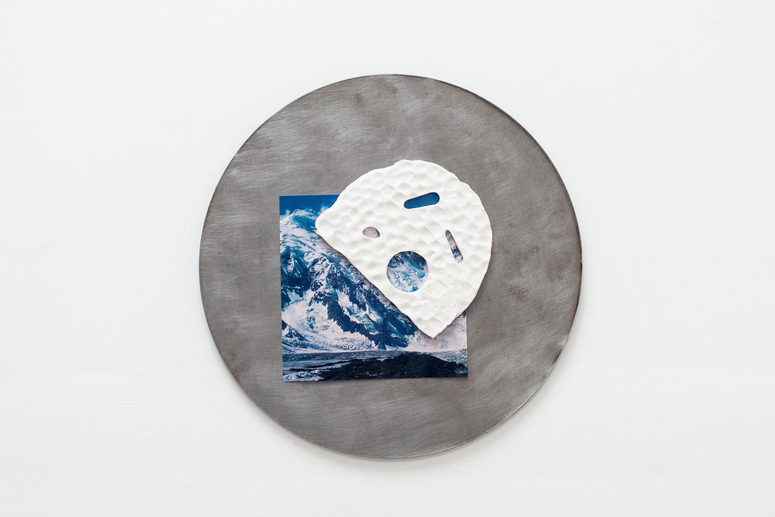Jon P. Geiger, Hondo Tondo #5 , 2017.. Glazed earthenware, found image, steel. 18" diameter.