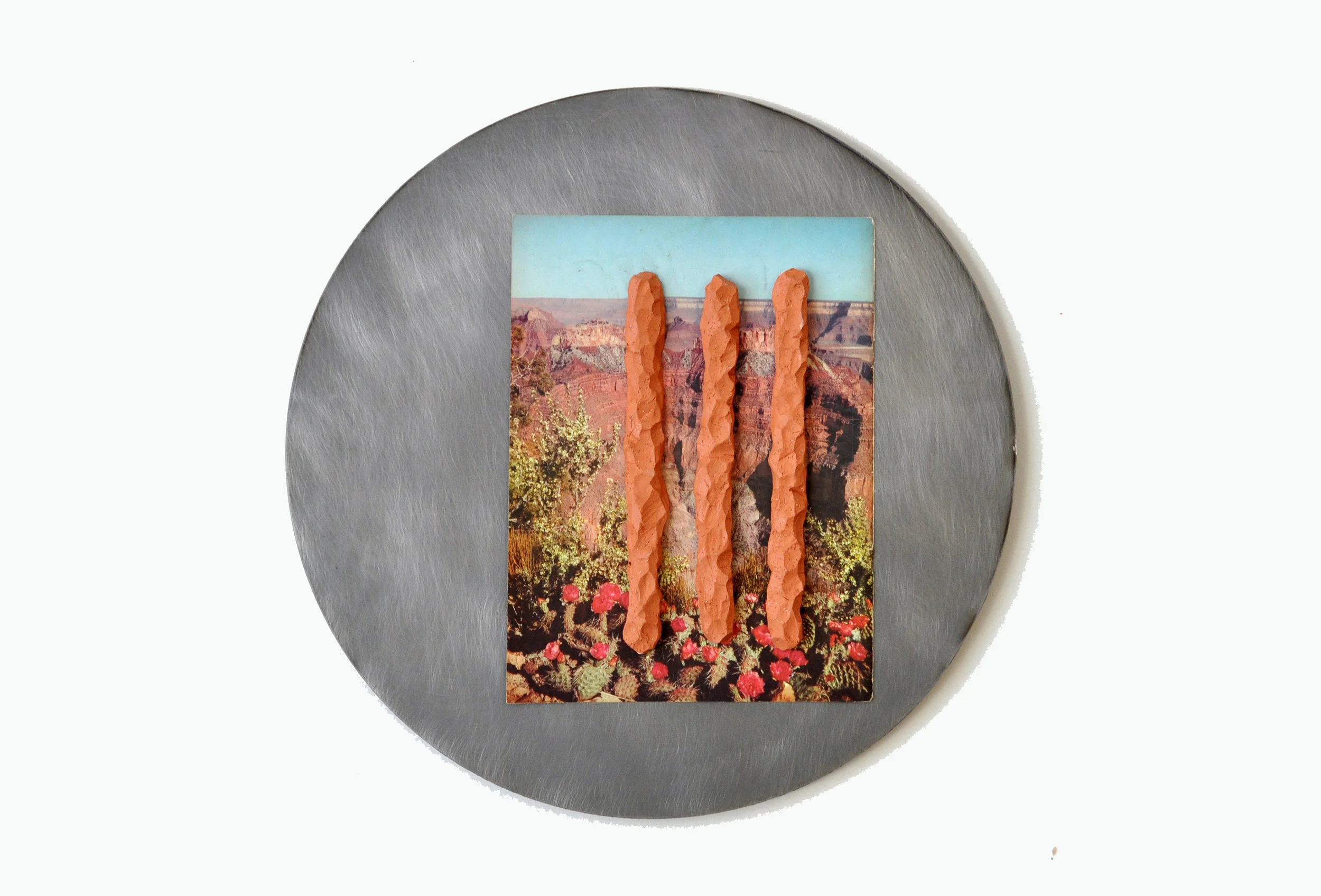 Jon P. Geige r, Hondo Tondo #1 , 2017. Terra cotta, found image, steel.. 18" diameter.