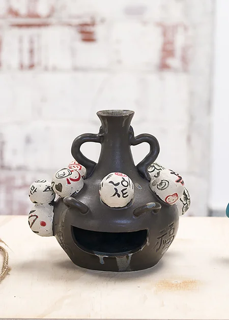 Jiha Moon, LOL, 2016. Earthenware, underglaze, glaze. 8.8 x 8.8 x 7 inches. Photo Credit: Phillip Maisel.