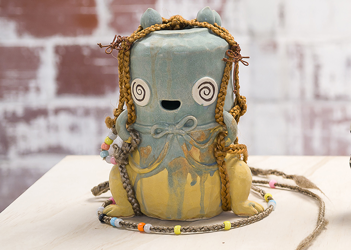 Jiha Moon, Blue Frog, 2016. Earthenware, underglaze, glaze, synthetic hair, plastic beads. 6.5 x 6.5 x 9 inches. Photo Credit: Phillip Maisel.