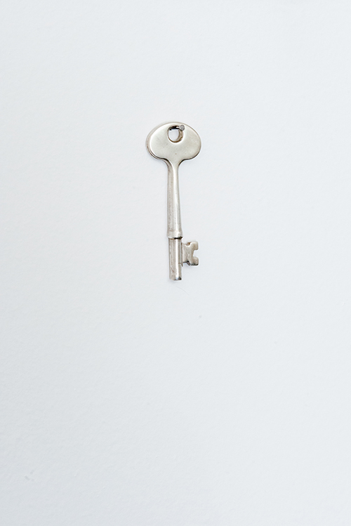 Breach , 2018. Duplicate front door key, sterling silver. Unlimited edition. 3" x 1" x 1/2"