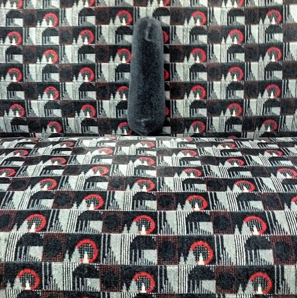 Seats on the Bakerloo Line. Image via tube_patterns