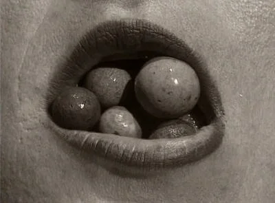 Contemporary resonances: artist Ann Hamilton utilizes the body and particularly the mouth in a number of projects, including the above "Untitled (mouth/stones)," that resemble Mercure's cover image.