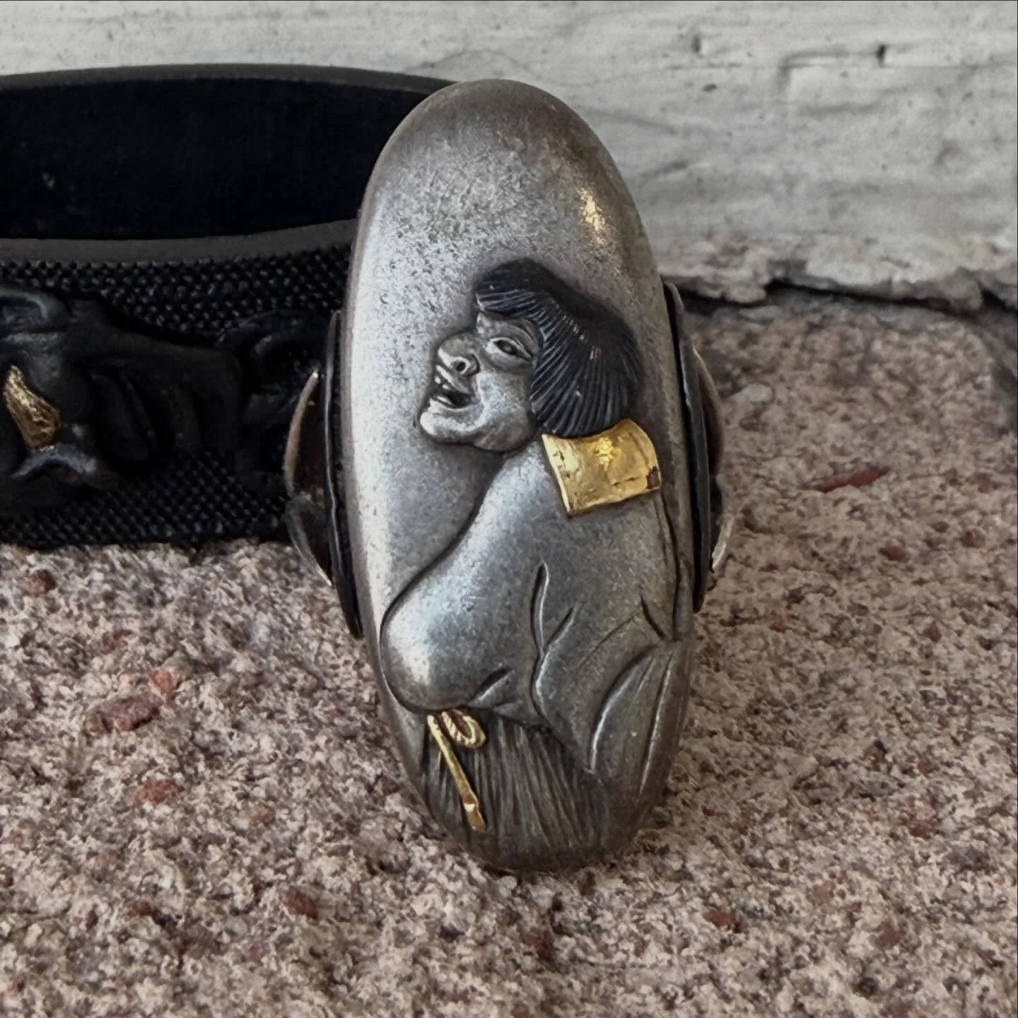 Really cool find from earlier this year, a shakudo ring made from the Kashira or base of a Japanese katana. The sword fitting piece dates from the 1700s to early 1800s and was likley assembled to be sold as jewelry in the 1870s, after swords became i