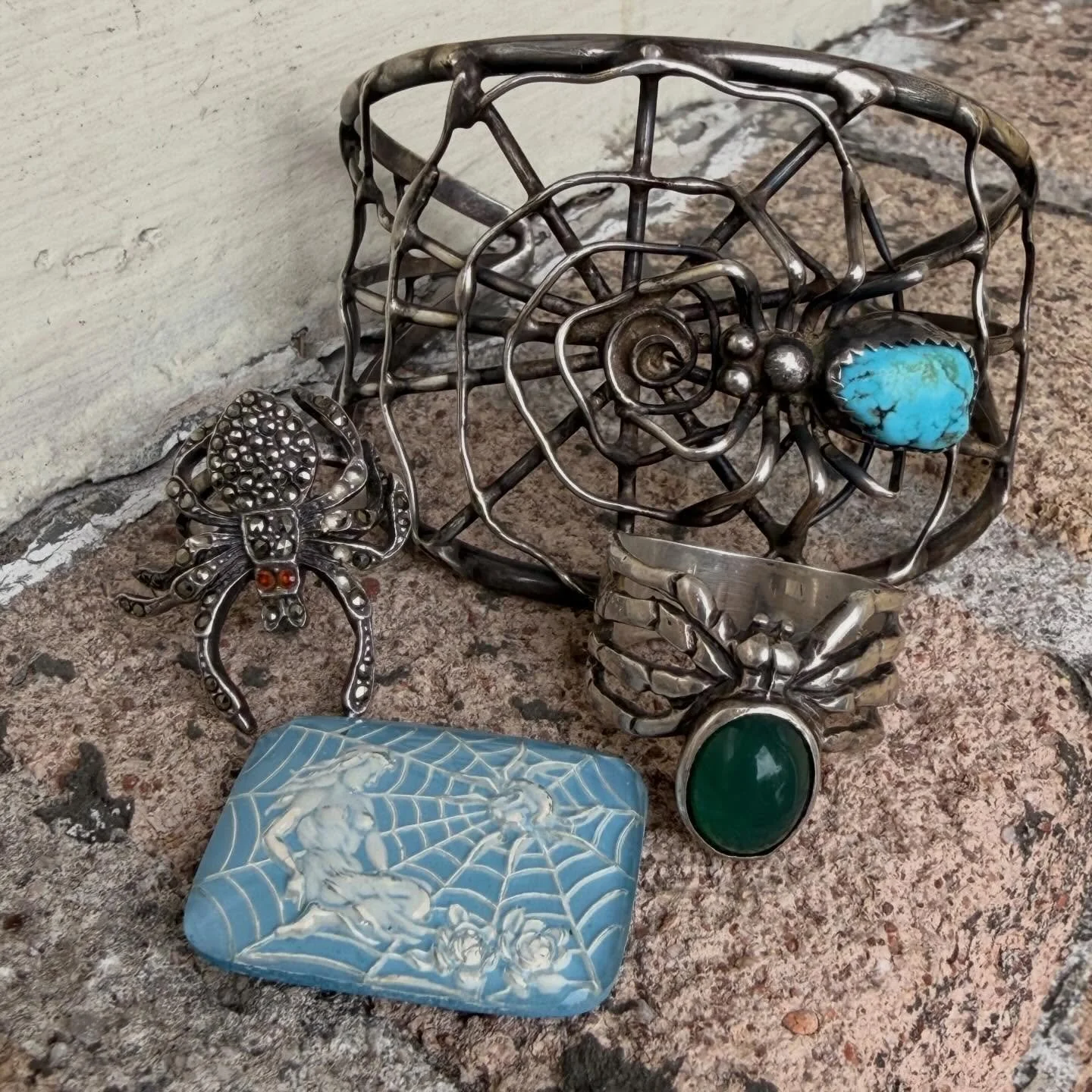 Spiders! Ah!

1970s Sterling rhinestone spider ring Size-4.5
1960s Sterling Jadeite Spider Ring Size-8
1960s Sterling Navajo bench made spider &amp; web cuff - Fits about 5.5-6.5 wrist, measures 2&rdquo; across top with 1 1/4&rdquo; opening.

DM for 