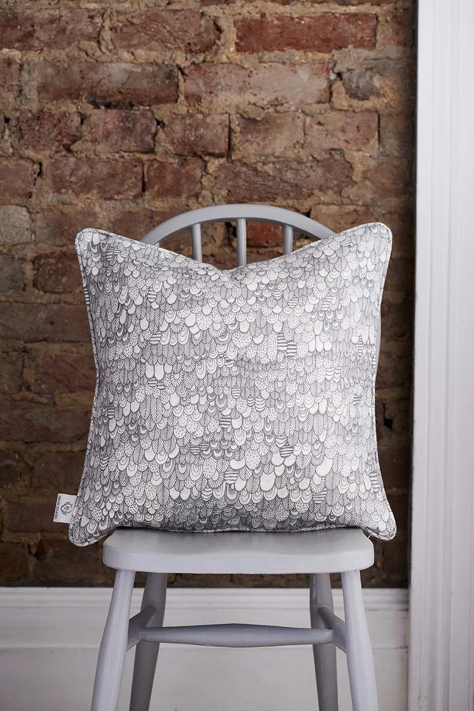 Bird in watercolour cushion cover by Abigail Edwards