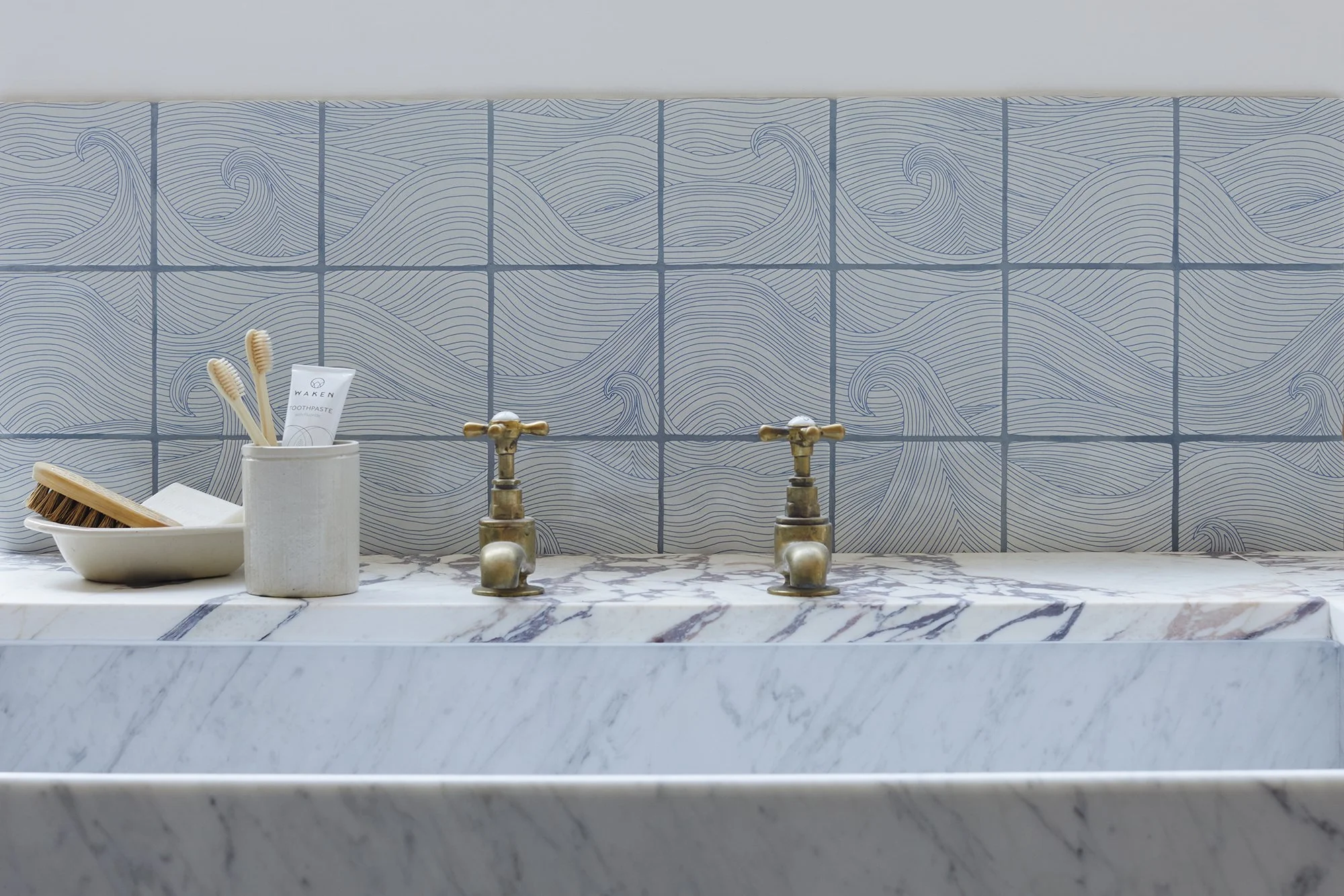 Blue hand painted tiles with Seascape Waves by Abigail Edwards