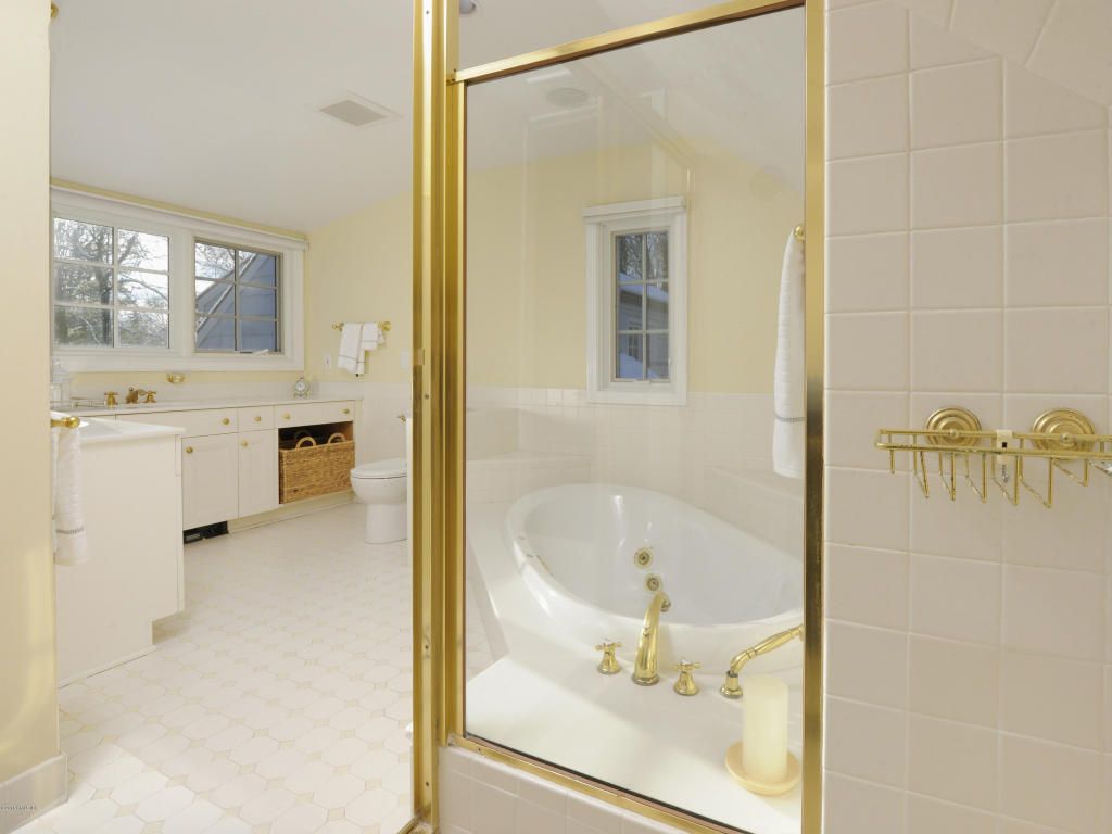 Fickle fashion: gold fixtures were all the rage in the 80s. Now, not so much. Wait'll you see the avocado refrigerator!
