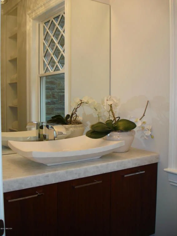Who the hell deliberately designs a sink to be unusable? 